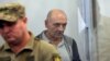 UKRAINE -- Volodymyr Tsemakh, former commander of Russian-backed separatist forces in eastern Ukraine, sits in a court room in Kyiv, Ukraine, Thursday Sept. 5, 2019.