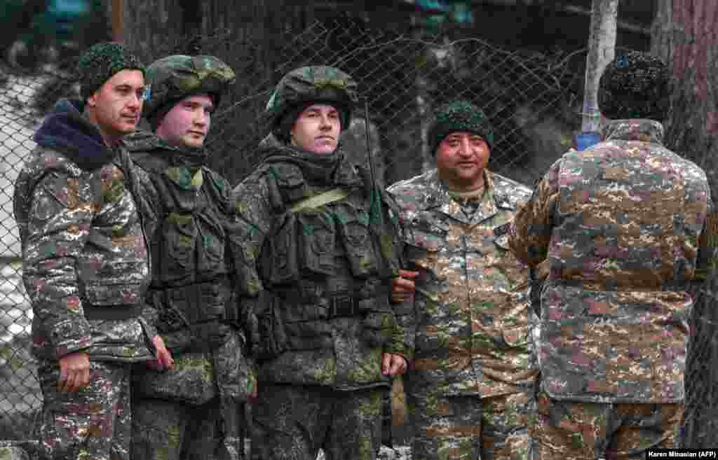 Over the past few weeks, posing for photos with Russian peacekeepers has become a standard pastime for Azerbaijani and Armenian servicemen alike. Here, Armenian soldiers are featured with two Russian peacekeepers (center) two days before the return of Azerbaijani troops to the town of Kalbacar (Karvachar in Armenian) on November 25, 2020. The Kalbacar region was the second territory restored to Azerbaijani control under Armenia, Azerbaijan, and Russia's November 9, 2020 ceasefire agreement.