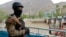 KYRGYZSTAN -- A Kyrgyz soldier guards a water supply facility outside the village of Kok-Tash near Kyrgyzstan-Tajikistan border, May 5, 2021 - AP
